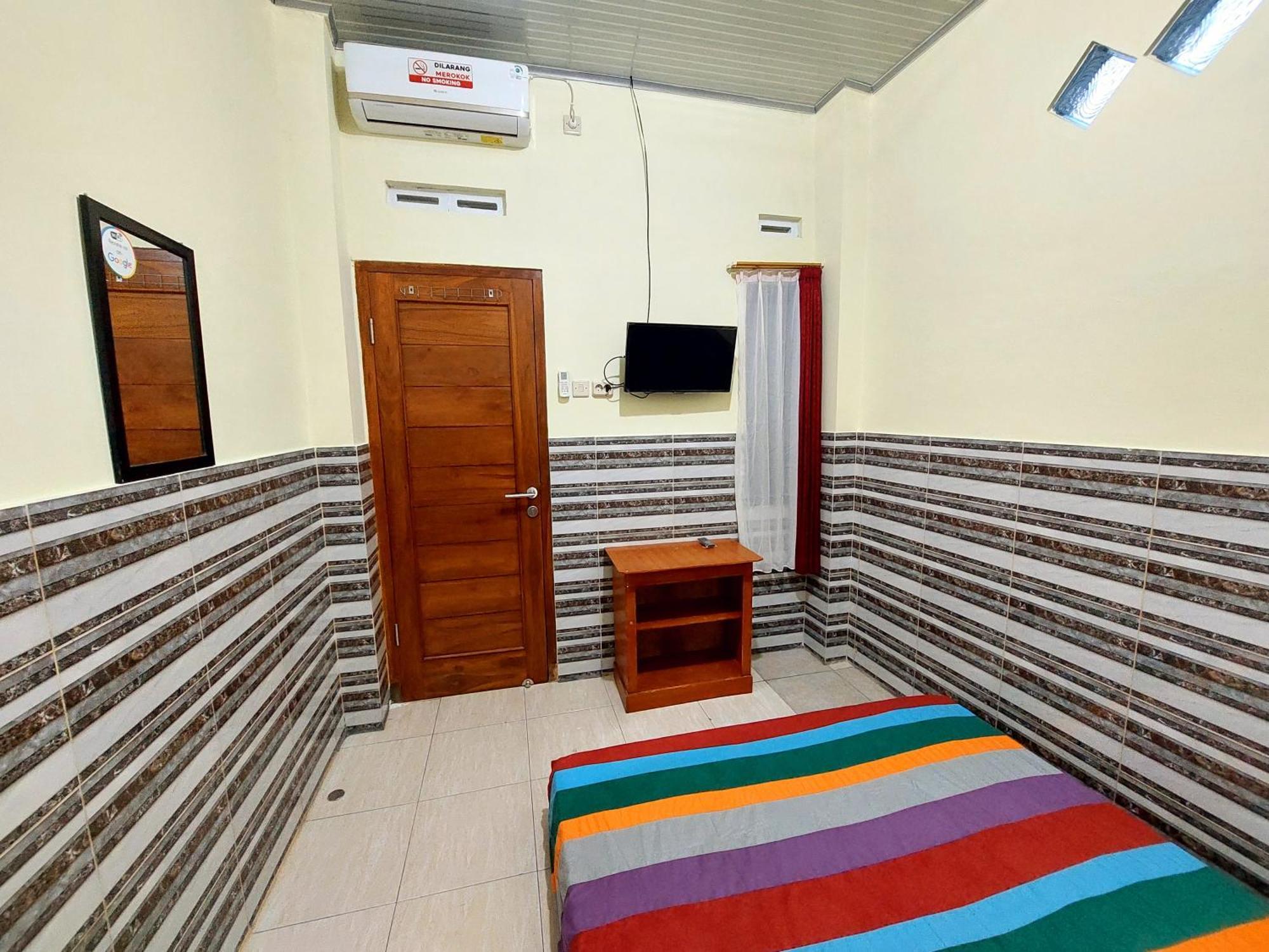 Griya Tugu Jogja Syariah Hotel Jogjakarta Kamer foto