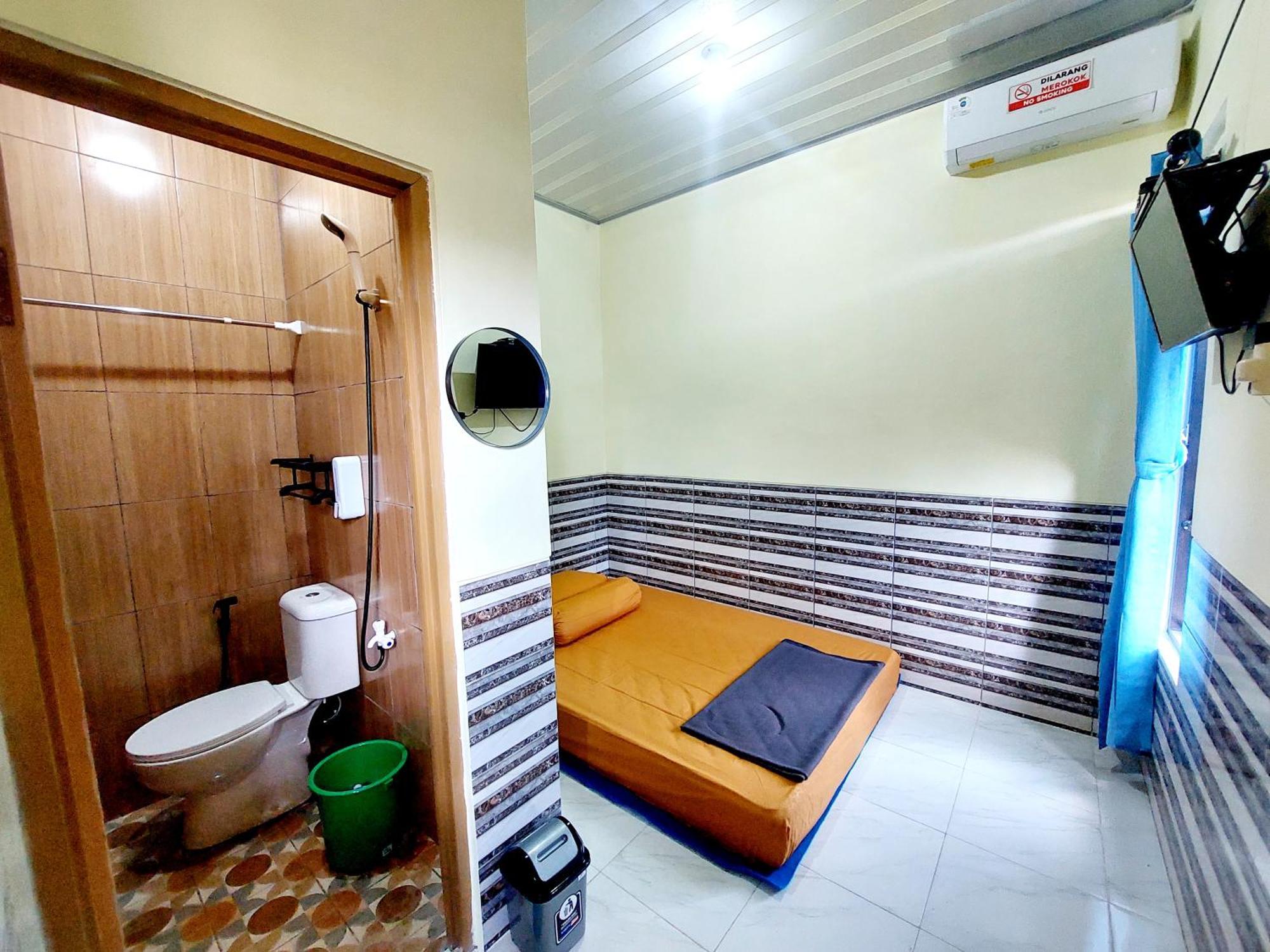 Griya Tugu Jogja Syariah Hotel Jogjakarta Kamer foto